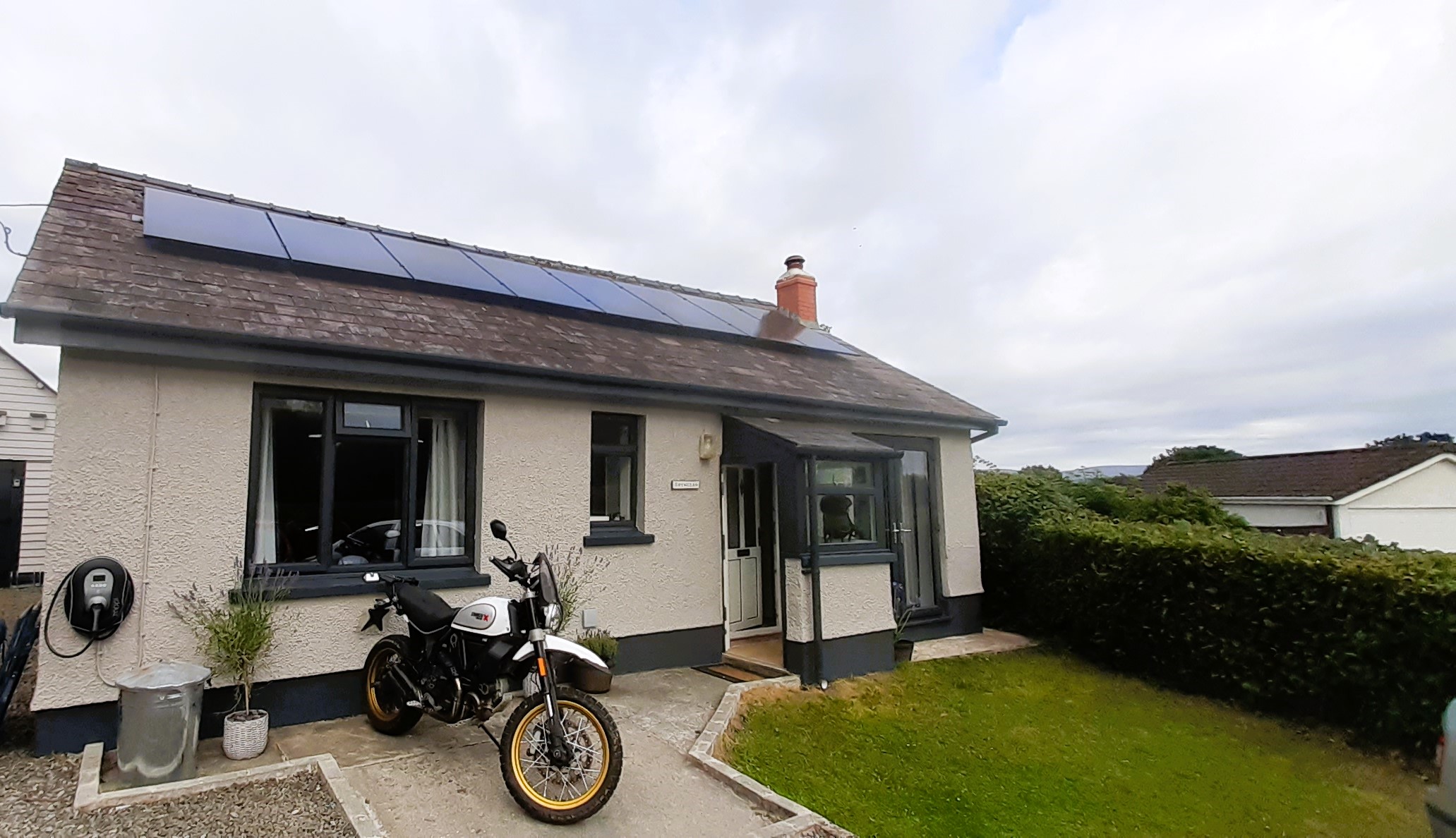 Solar panels and EV charger in Wales