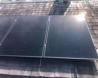 _solar_panels_on_roof_Tangle_wood_cottage__Llandeilo_Carmarthenshire_Wales